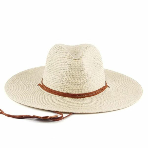 on voit sur un fond blanc un chapeau de paille élégant de couleur beige pour femme