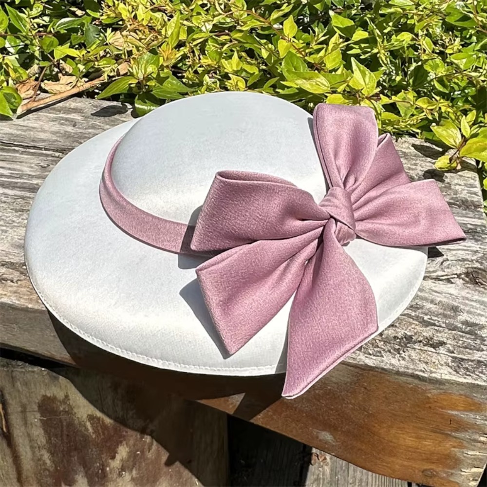 chapeau bibi noir élégant pour femme avec nœud chic